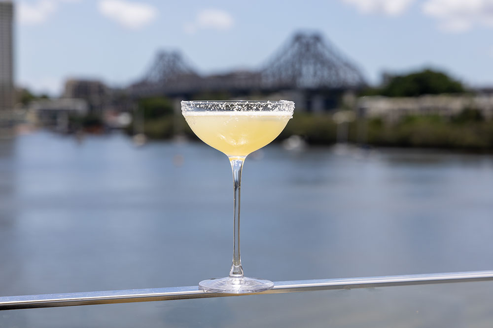Stilts Dining Kangaroo Point Glass of wine on ledga at Stilts Dining