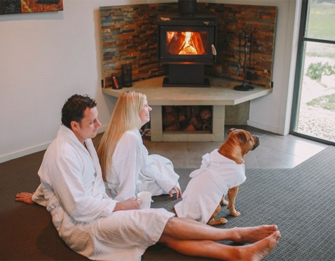 Alure Stanthorpe Couple with dog inside room at Alure Stanthorpe