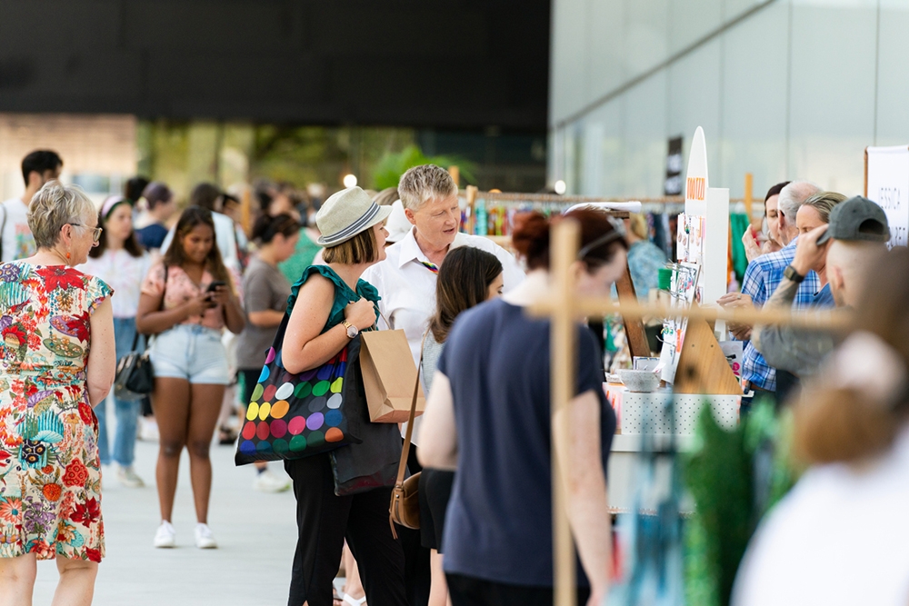 People browsing stalls QAGOMA Christmas Design Market